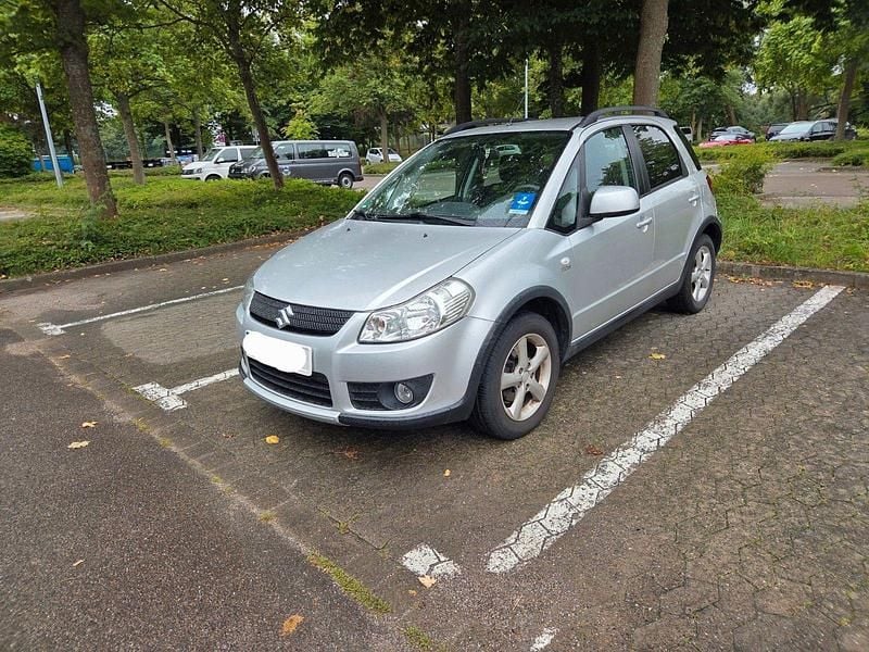 Silber Gebraucht 2008 Suzuki SX4 Comfort Limousine | 4.680 € (Fairer Preis) - Bild 1/4