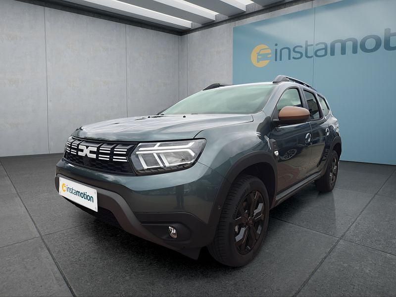 Grün Gebraucht 2024 Dacia Duster SUV | 25.649 € (Etwas zu teuer) - Bild 1/4