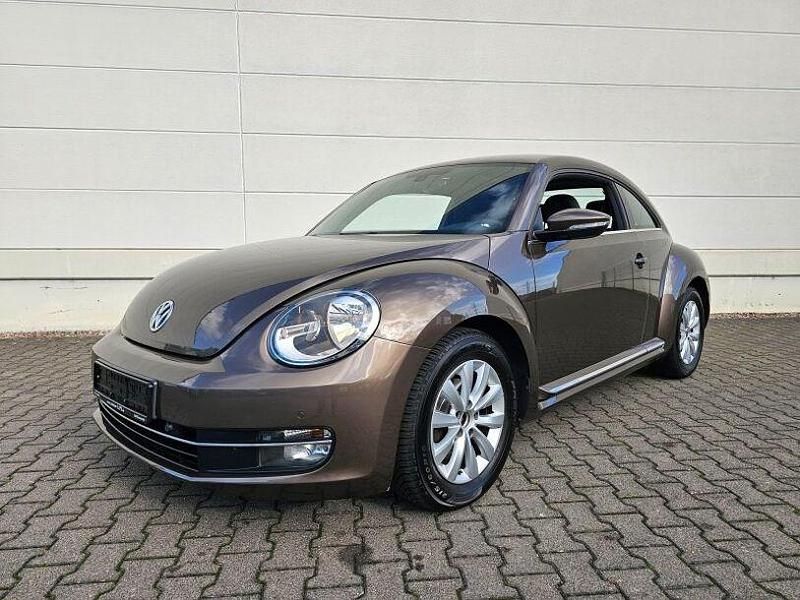 Gebraucht VW Beetle Design 105 PS (77 kW) 2012 Toffeebraun metallic Kleinwagen