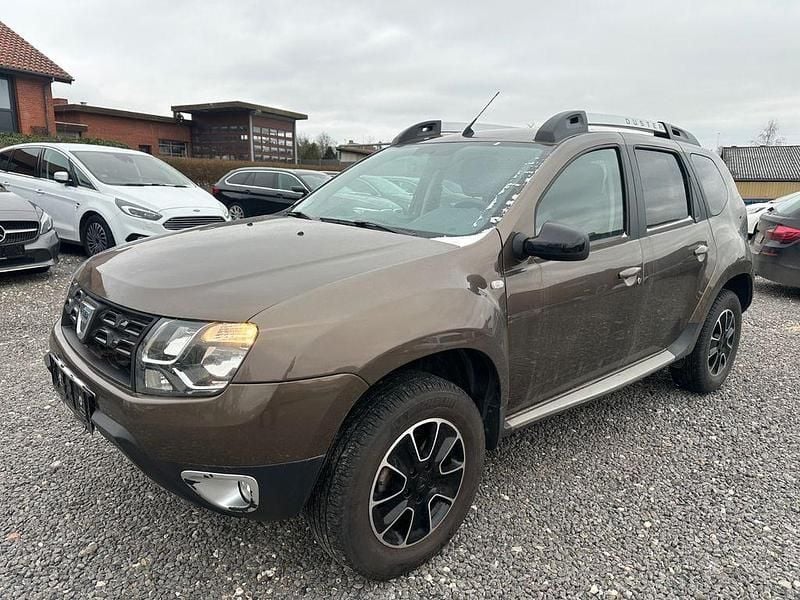Braun Gebraucht 2018 Dacia Duster Lauréate SUV | 7.999 € - Bild 1/4