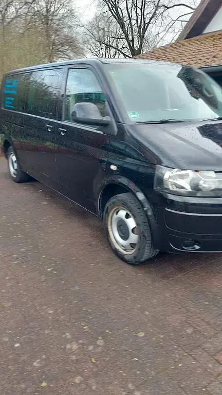 Używany VW Caravelle 179 KM (131 kW) 2012 Czarny Van