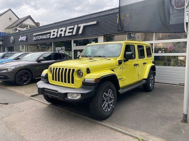 Gelb Neu 2024 Jeep Wrangler Unlimited Sahara SUV | 73.990 € (Fairer Preis) - Bild 1/4