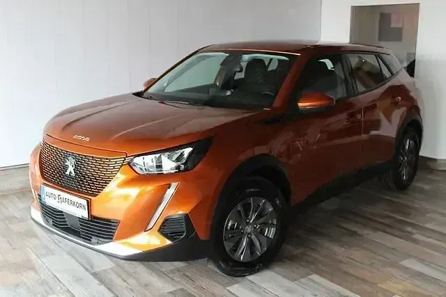 Gebraucht Peugeot e-2008 Active 100 kW (136 PS) 2021 Orange SUV