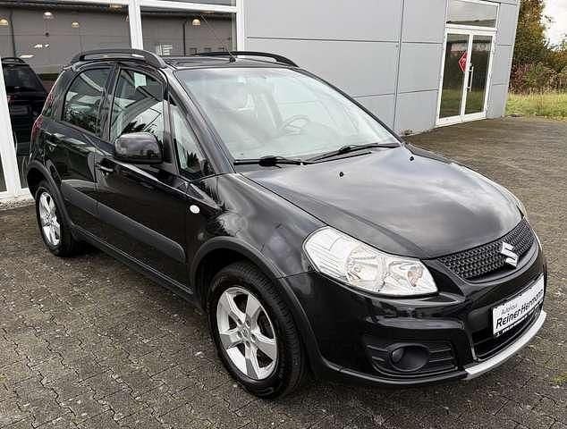 Cosmic black pearl metallic Gebraucht 2014 Suzuki SX4 SUV | 8.880 € (Fairer Preis) - Bild 1/4
