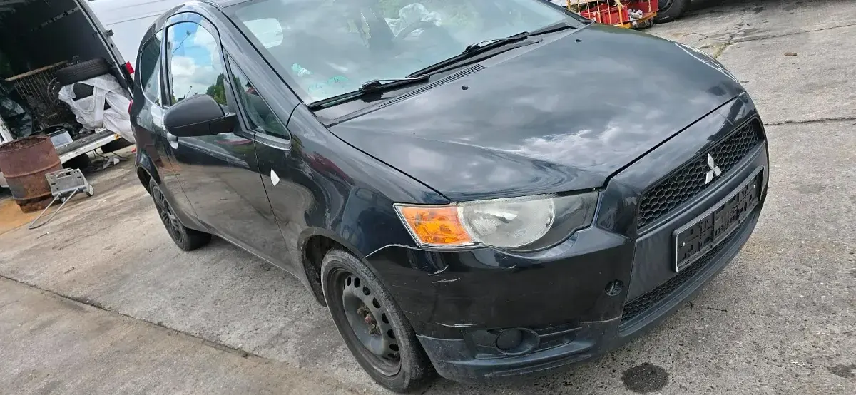 Gebraucht Mitsubishi Colt 75 PS (55 kW) 2010 Schwarz Kleinwagen