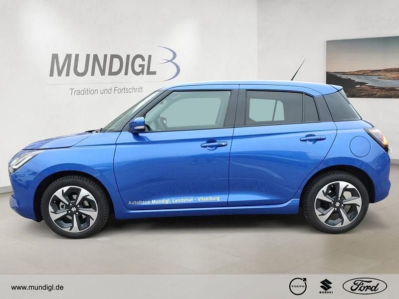 Gebraucht Suzuki Swift Comfort+ 83 PS (61 kW) 2024 Frontier blue pearl metallic Kleinwagen