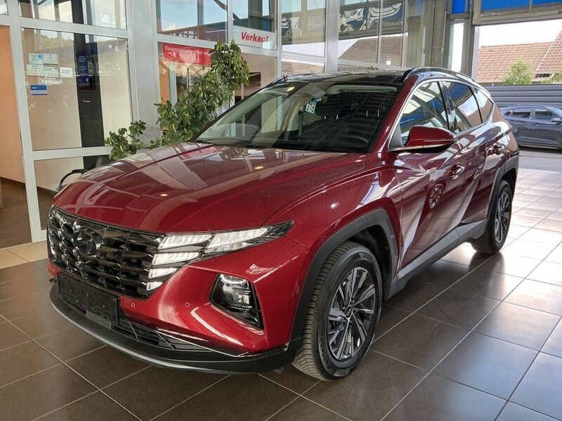 Rot sunset red / mic Gebraucht 2020 Hyundai Tucson Trend SUV | 28.500 € (Etwas zu teuer) - Bild 1/4