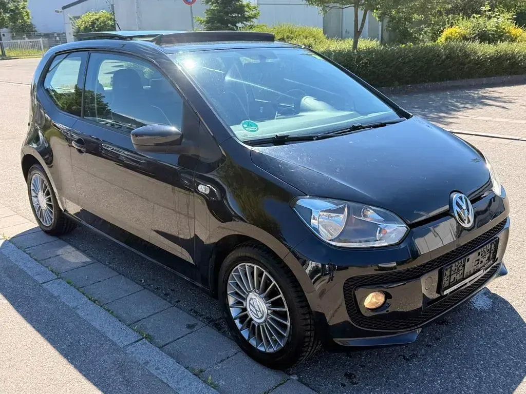 Usado VW up! 75 CV (55 kW) 2012 Negro Utilitario