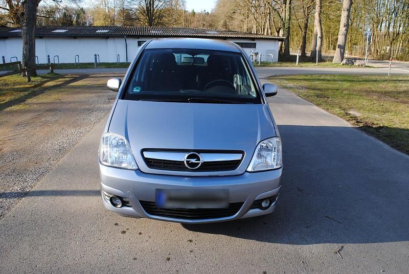 Second-hand Opel Meriva 105 CP (77 kW) 2009 Argintiu Monovolum