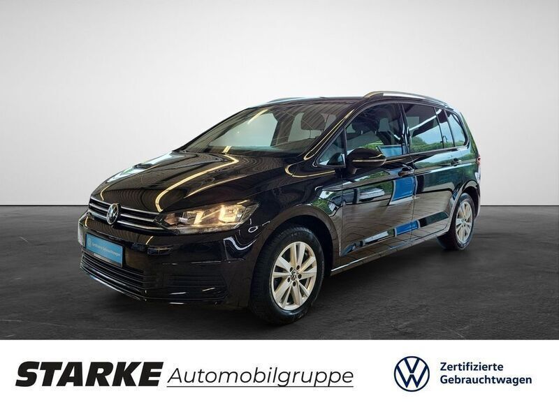 Schwarz (deep black perleffekt) Gebraucht 2024 VW Touran Comfortline Van / Kleinbus | 33.430 € (Fairer Preis) - Bild 1/4