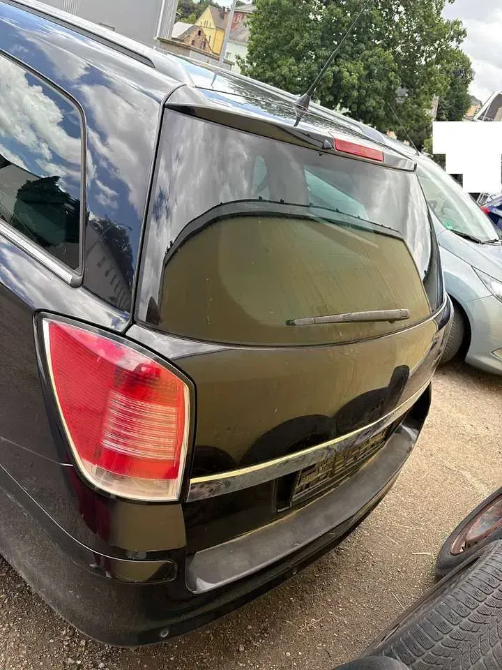 Gebraucht Opel Astra 105 PS (77 kW) 2004 Schwarz Kombi