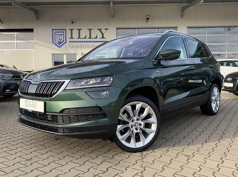 Grün Gebraucht 2021 Skoda Karoq Drive SUV | 24.750 € (Fairer Preis) - Bild 1/4