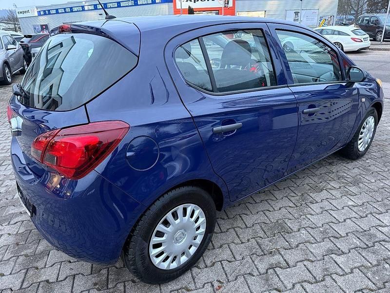 Używany Opel Corsa Selection 69 KM (50 kW) 2016 Niebieski Sedan/Limuzyna