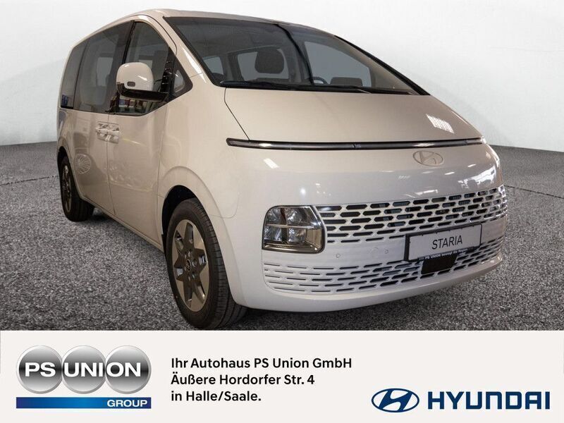 Creamy white Neu 2024 Hyundai Staria Prime Van | 46.450 € - Bild 1/4