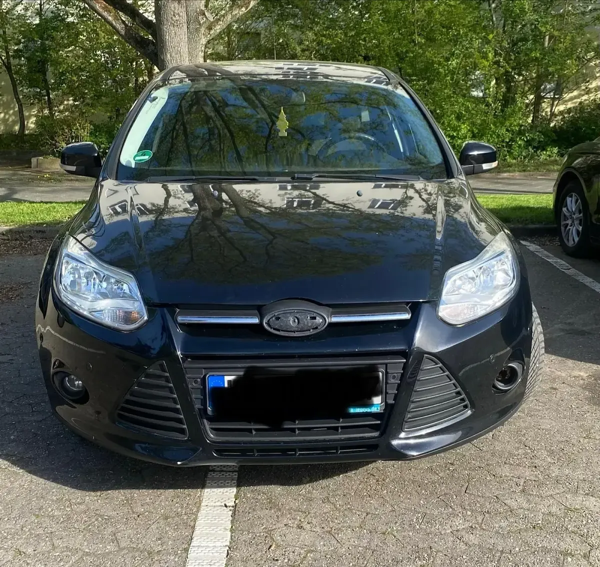 Używany Ford Focus 101 KM (74 kW) 2013 Czarny Sedan/Limuzyna