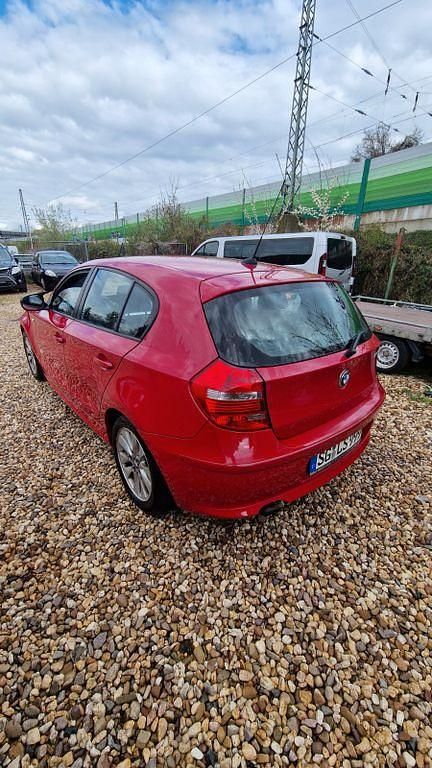 Gebraucht BMW 116 Advantage 122 PS (89 kW) 2011 Rot Kleinwagen