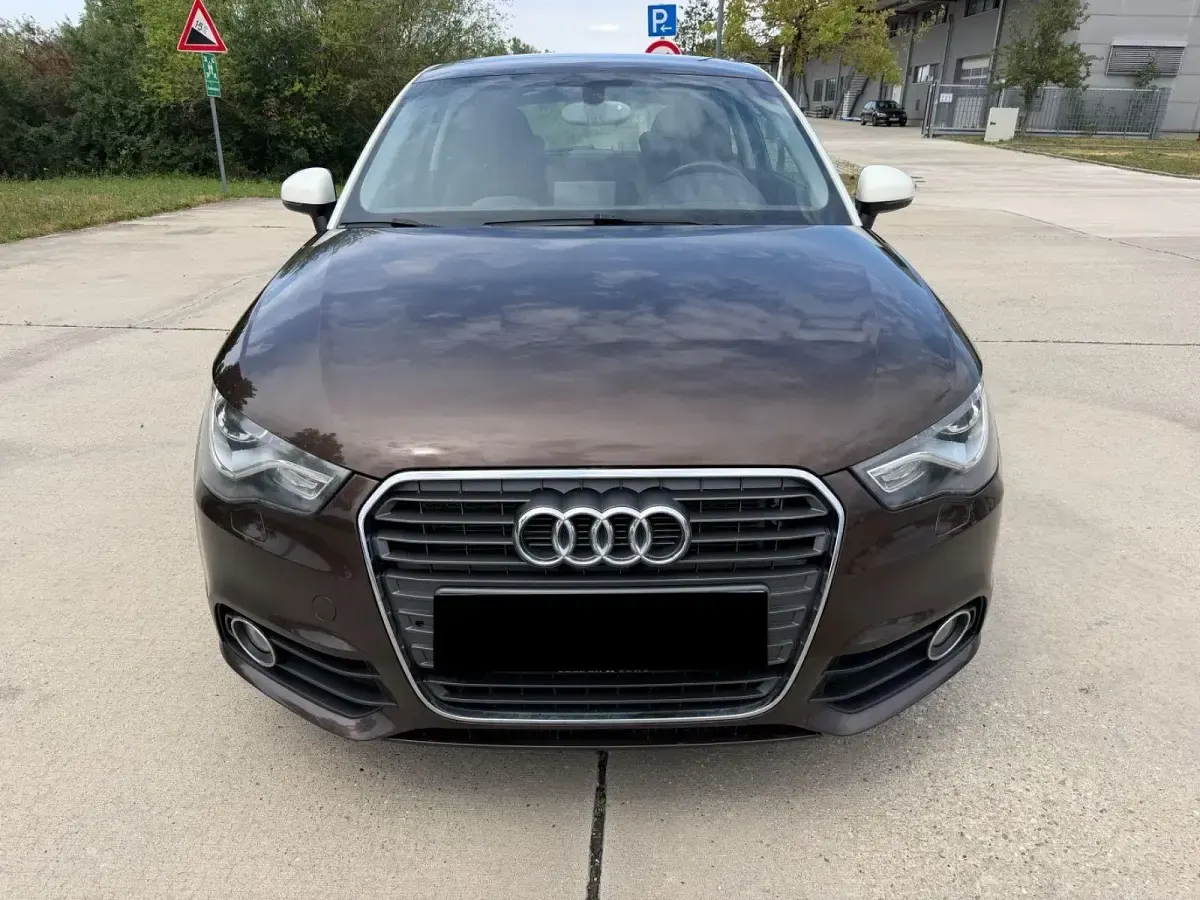 Gebraucht Audi A1 Ambition 105 PS (77 kW) 2012 Braun Kleinwagen