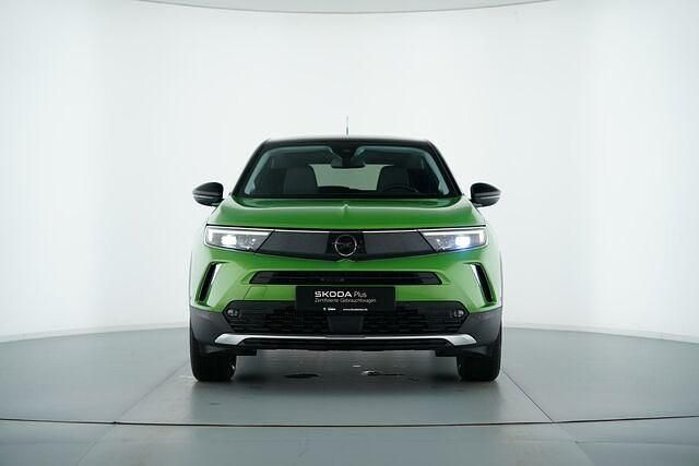 Gebraucht Opel Mokka Elegance 131 PS (96 kW) 2021 Matcha green/ikone gruen SUV