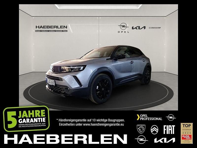 Kontrast grau/quarz silber Gebraucht 2023 Opel Mokka-e GS Line SUV | 19.490 € (Fairer Preis) - Bild 1/4