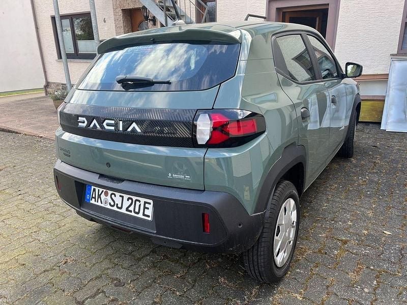 Grün Gebraucht 2025 Dacia Spring Essentiel Kleinwagen | 14.800 € (Guter Preis) - Bild 1/4