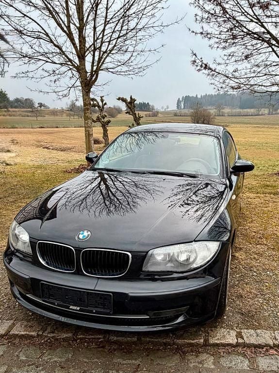Second-hand BMW 116 122 CP (89 kW) 2009 Negru Hatchback