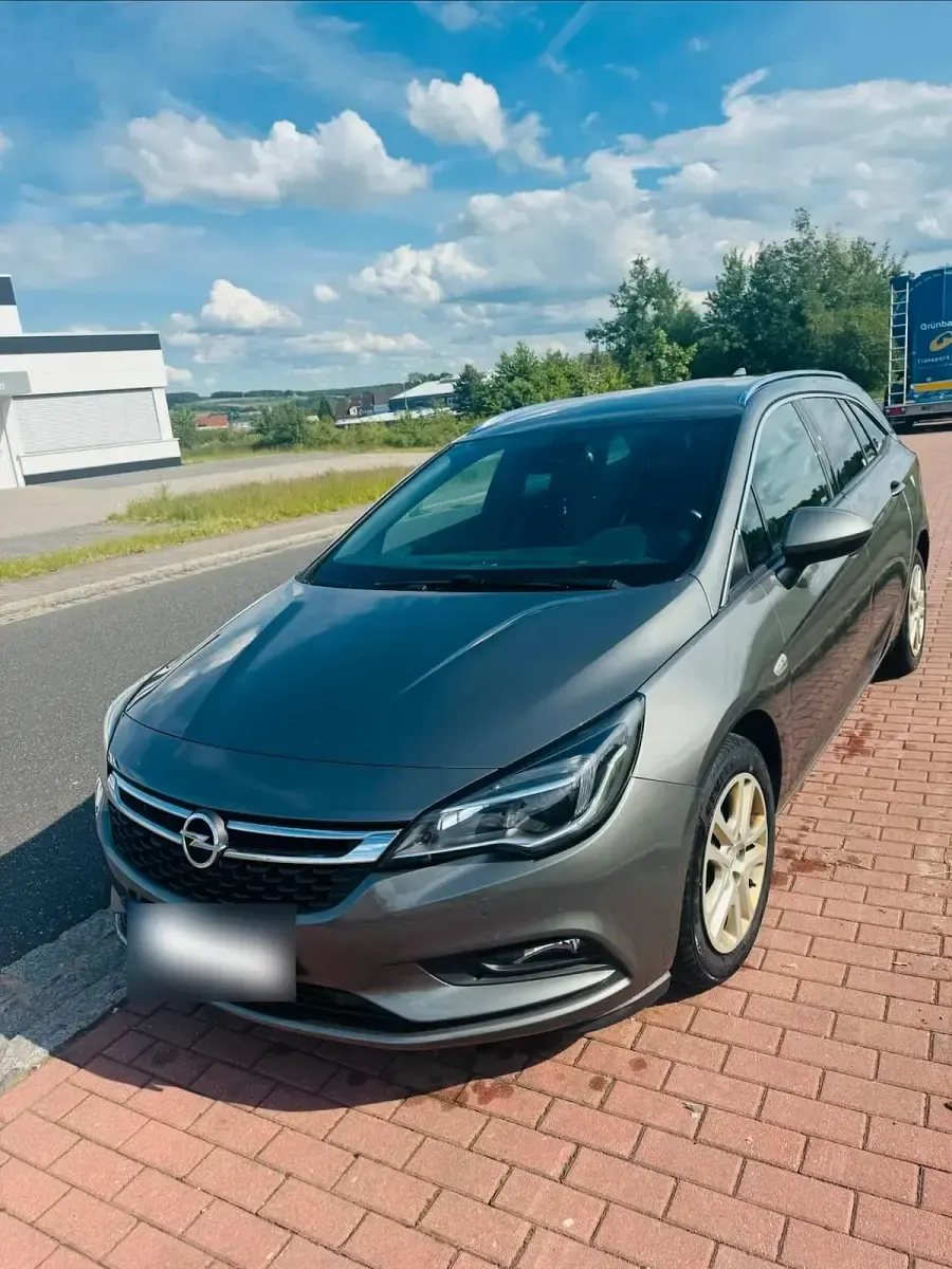 Gebraucht Opel Astra 125 PS (91 kW) 2017 Grau Kombi