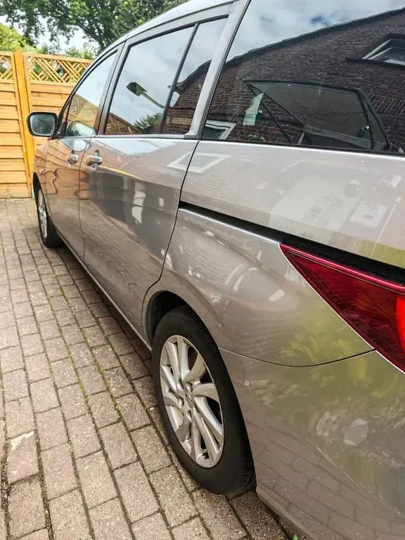 Gebraucht Mazda 5 116 PS (85 kW) 2011 Silber Van / Kleinbus