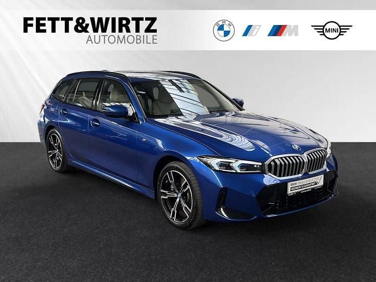 Portimao blau metallic Gebraucht 2024 BMW 330e M Sport Kombi | 39.900 € (Superpreis) - Bild 1/2