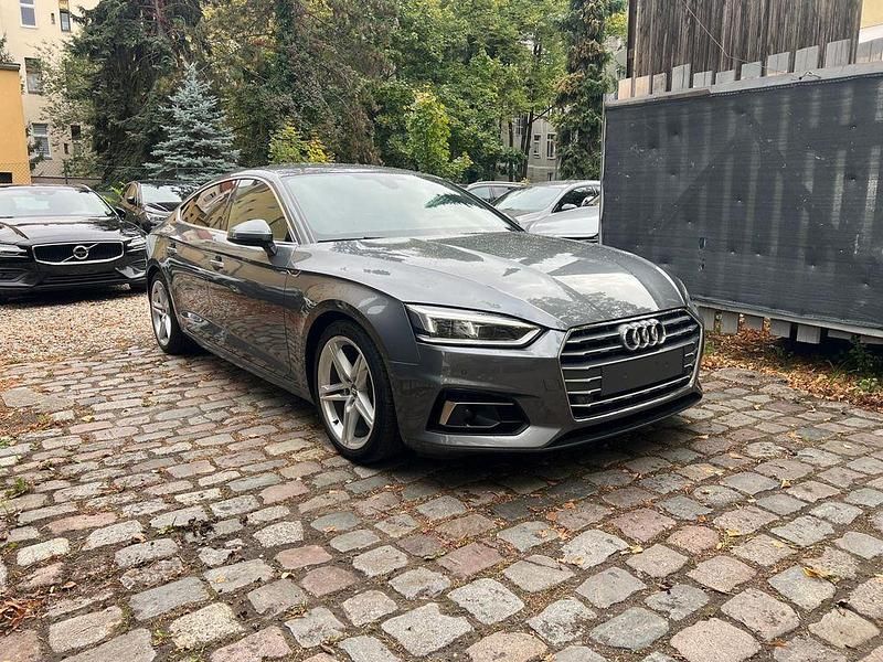 Monsungrau metallic Gebraucht 2019 Audi A5 Sportback S-Line Limousine | 22.900 € (Guter Preis) - Bild 1/4