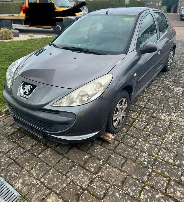 Gebraucht Peugeot 206 62 PS (45 kW) 2011 Grau Kleinwagen