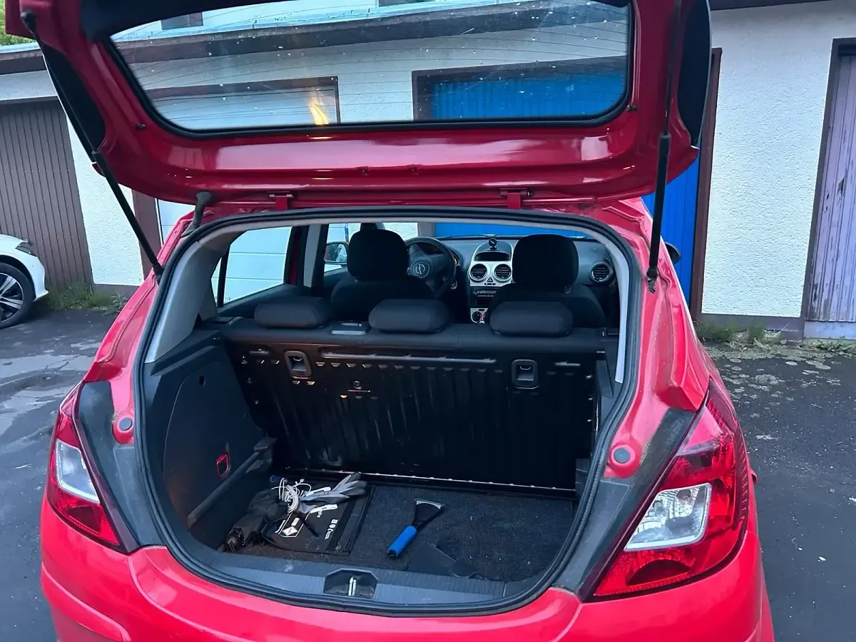 Second-hand Opel Corsa 60 CP (44 kW) 2009 Roșu Hatchback