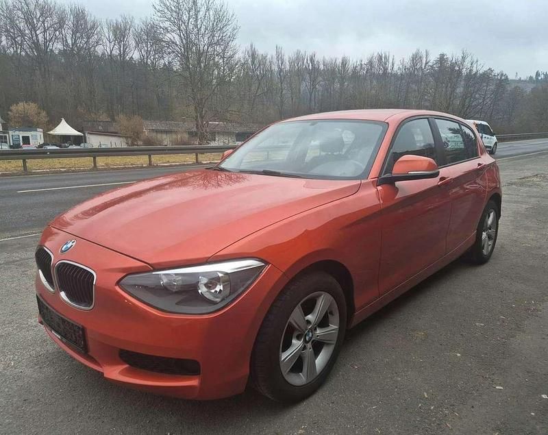 Gebraucht BMW 116 136 PS (100 kW) 2013 Valencia orange metallic Kleinwagen