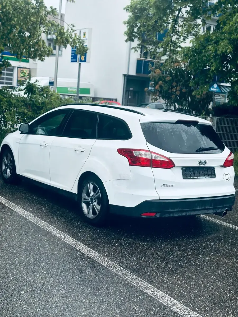 Używany Ford Focus 140 KM (102 kW) 2014 Biały Kombi