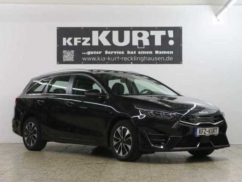 Schwarz (metallic) Gebraucht 2024 Kia Ceed Spirit Kombi | 29.950 € (Teuer) - Bild 1/4