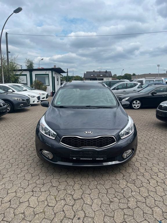 Grau Gebraucht 2014 Kia Ceed Sportswagon Spirit Kombi | 8.999 € (Fairer Preis) - Bild 1/4