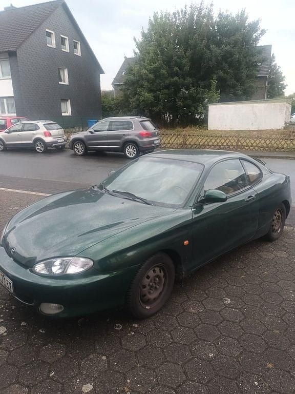 Grün Gebraucht 1998 Hyundai Tiburon Coupé | 1.000 € - Bild 1/4