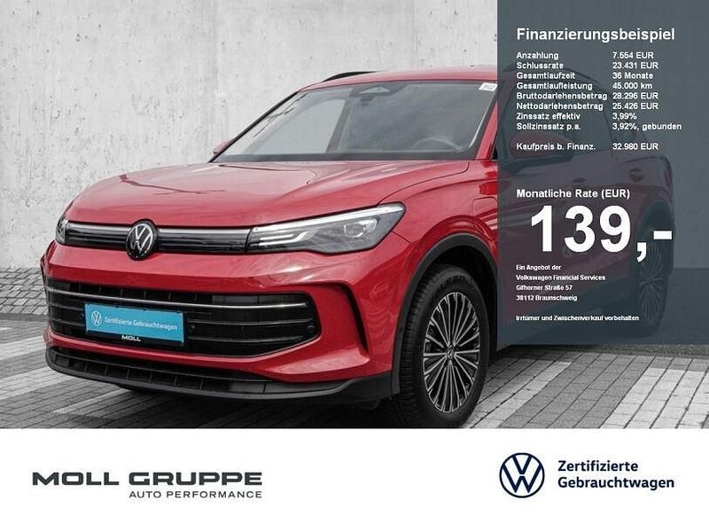 Persimmon red metallic Gebraucht 2024 VW Tiguan Life SUV | 32.980 € (Fairer Preis) - Bild 1/4