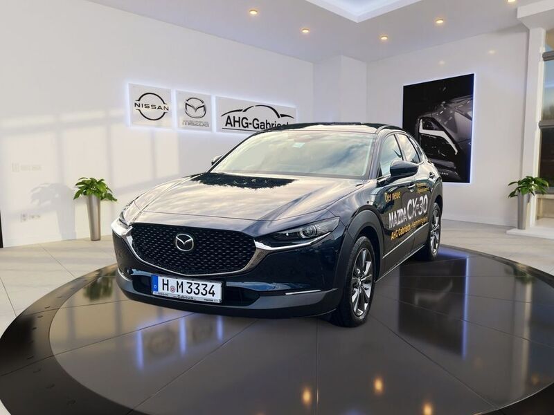 Deep crystal blue Gebraucht 2023 Mazda CX-30 Exclusive-Line SUV | 30.990 € (Fairer Preis) - Bild 1/4