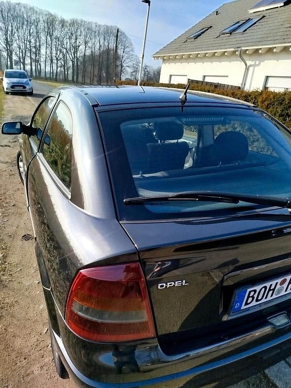 Gebraucht Opel Astra 125 PS (91 kW) 2000 Schwarz Coupé
