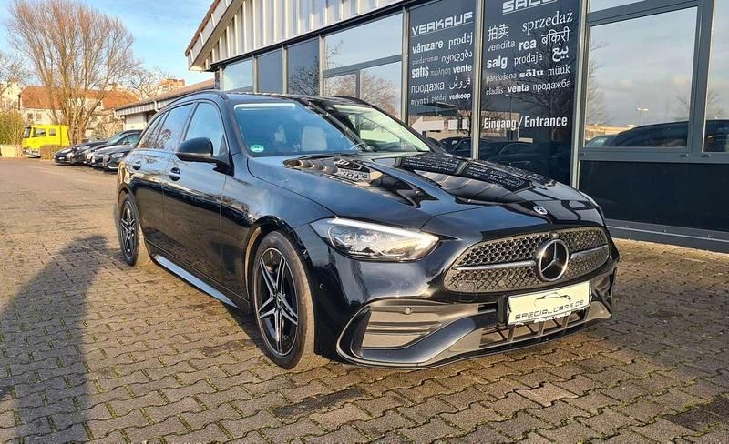 Schwarz Gebraucht 2022 Mercedes C220 AMG line Kombi | 29.990 € (Fairer Preis) - Bild 1/4