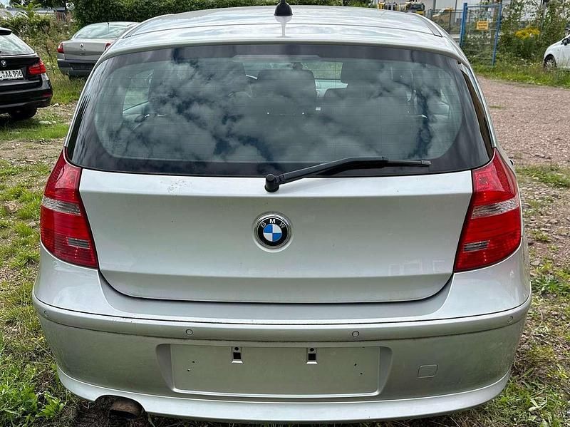 Second-hand BMW 116 122 CP (89 kW) 2009 Argintiu Hatchback