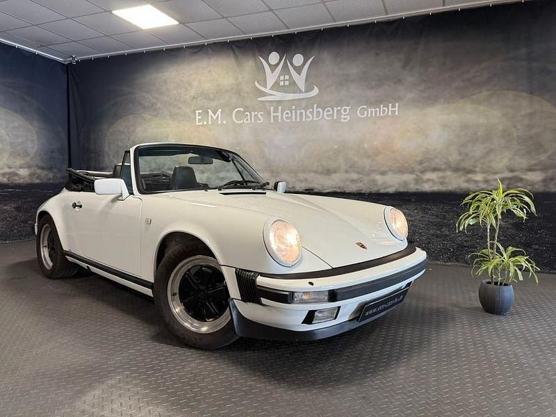Weiß Gebraucht 1986 Porsche 911 Carrera Cabriolet Cabrio | 77.911 € - Bild 1/4