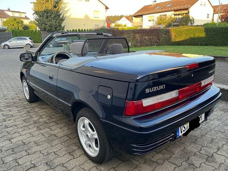 Blau Gebraucht 1995 Suzuki Swift Cabrio | 5.900 € - Bild 1/4