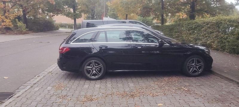 Schwarz Gebraucht 2019 Mercedes C200 AMG line Kombi | 23.900 € (Superpreis) - Bild 1/4