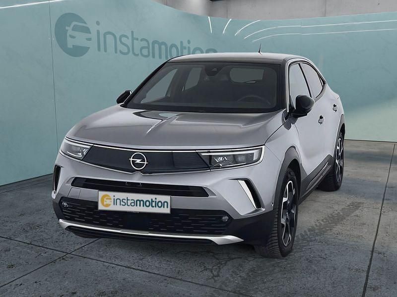 Silber Gebraucht 2022 Opel Mokka-e Ultimate SUV | 22.699 € (Teuer) - Bild 1/4