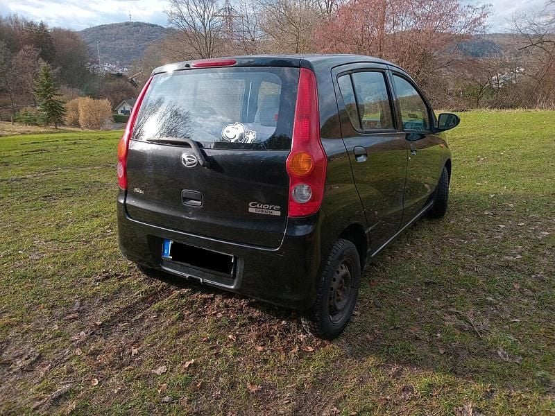 Gebraucht Daihatsu Cuore 69 PS (50 kW) 2009 Schwarz Kleinwagen