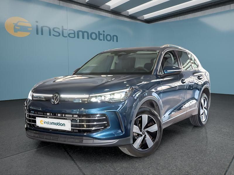 Blau Gebraucht 2024 VW Tiguan SUV | 43.599 € (Fairer Preis) - Bild 1/4
