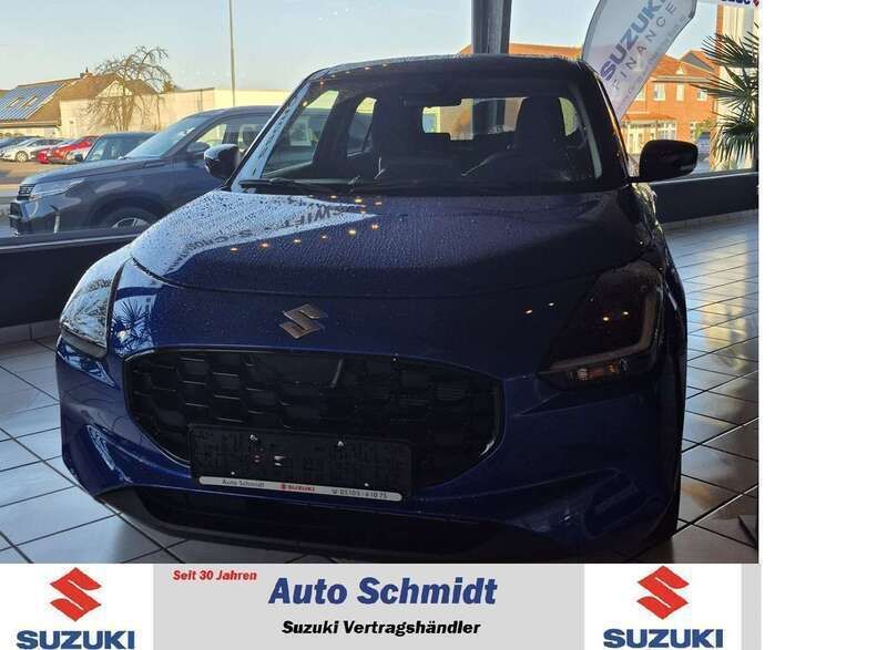 Blau Neu 2024 Suzuki Swift Comfort+ Limousine | 19.990 € - Bild 1/4