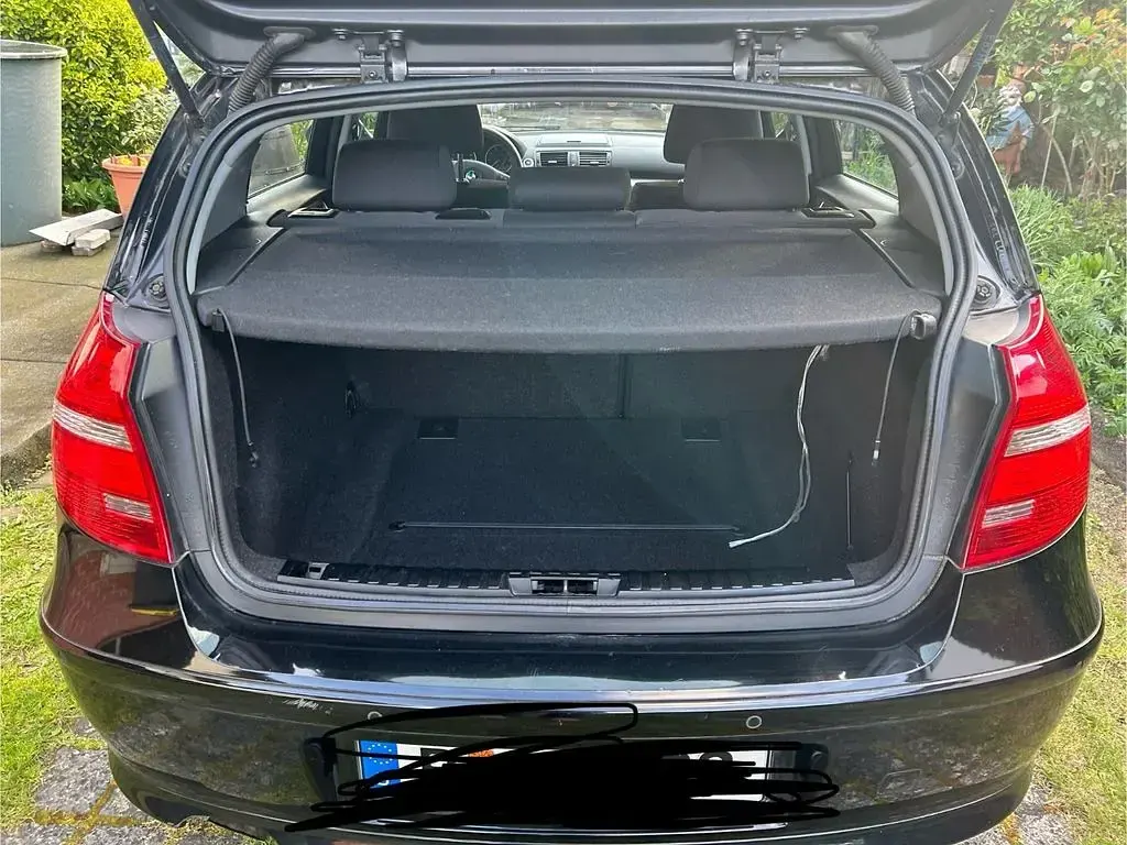 Gebraucht BMW 116 122 PS (89 kW) 2009 Schwarz Kleinwagen
