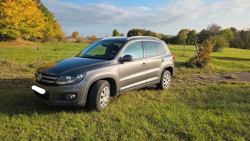 Grau Gebraucht 2013 VW Tiguan Sportline SUV | 9.900 € (Fairer Preis) - Bild 1/4